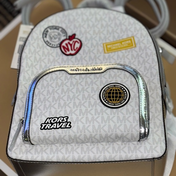 Michael Kors Handbags - Michael Kors 🆕 mk White and Silver summer travel Backpack with dustbag
NO BOX